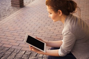 Woman with tablet by Anna Demianenko